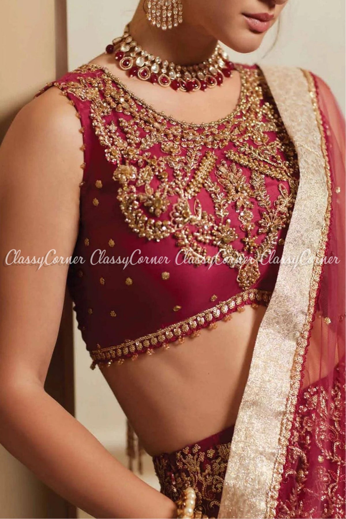 Maroon Golden Net Embellished Wedding Wear Lehenga Choli