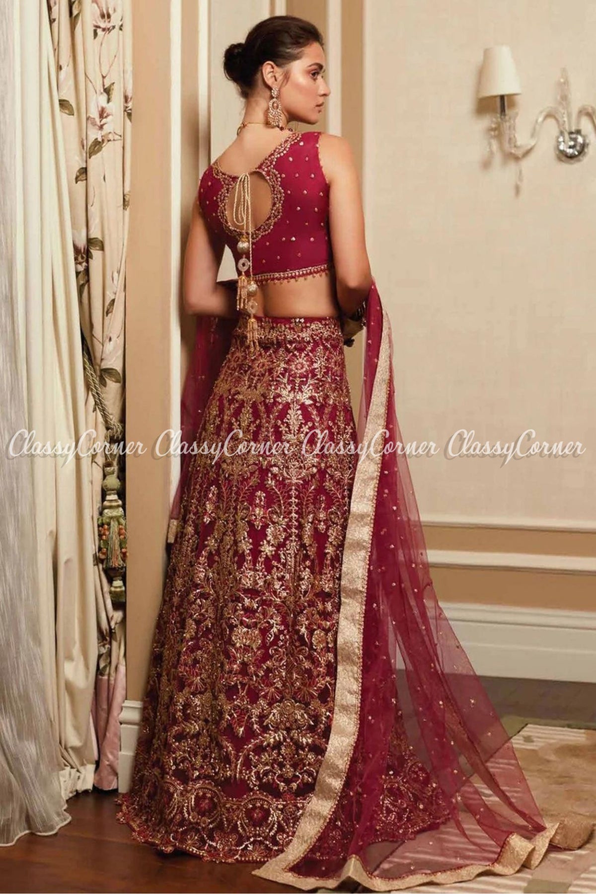 Maroon Golden Net Embellished Wedding Wear Lehenga Choli